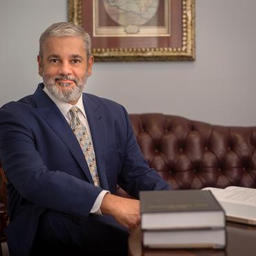 Criminal defense attorney A. Oliver Hassibi in his law office.